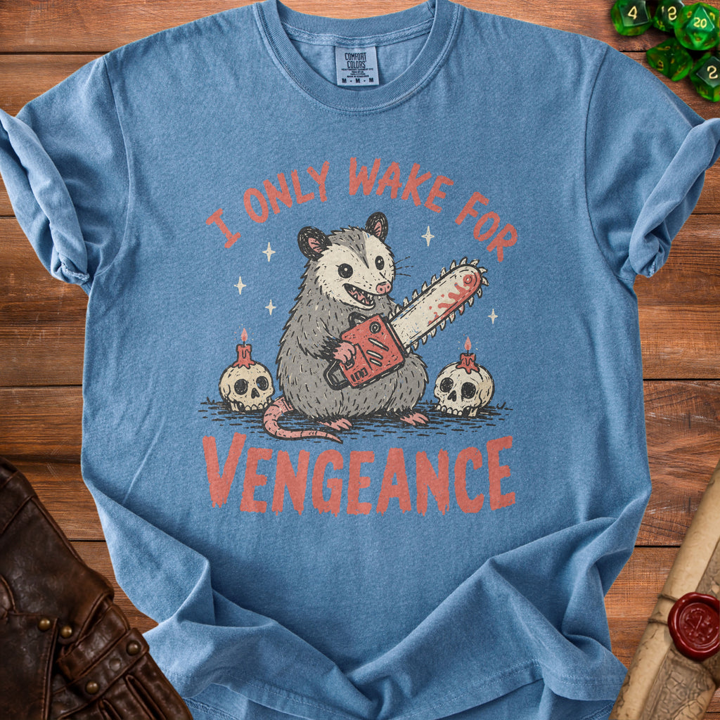 Blue t-shirt with possum holding chainsaw and text "I ONLY WAKE FOR VENGEANCE".