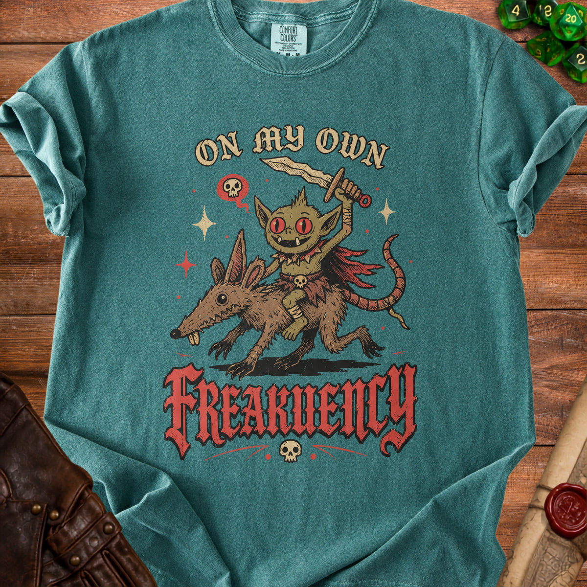 Goblin riding a rat with a sword, text "ON MY OWN FREAKUENCY".