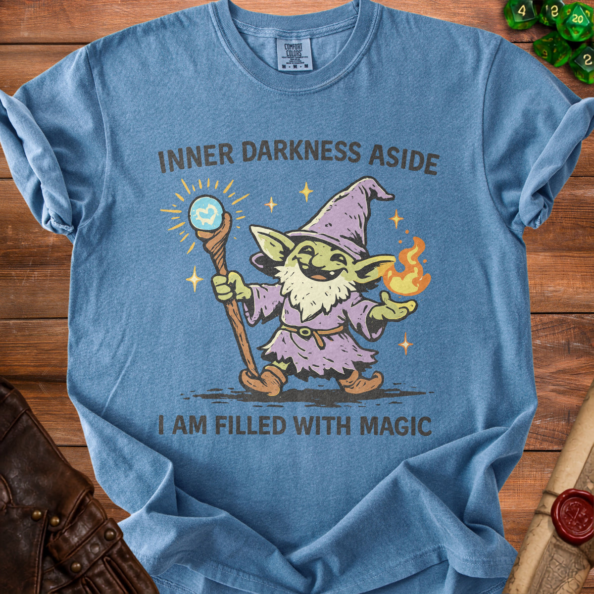 Blue t-shirt with a goblin wizard graphic and text "INNER DARKNESS ASIDE I AM FILLED WITH MAGIC".