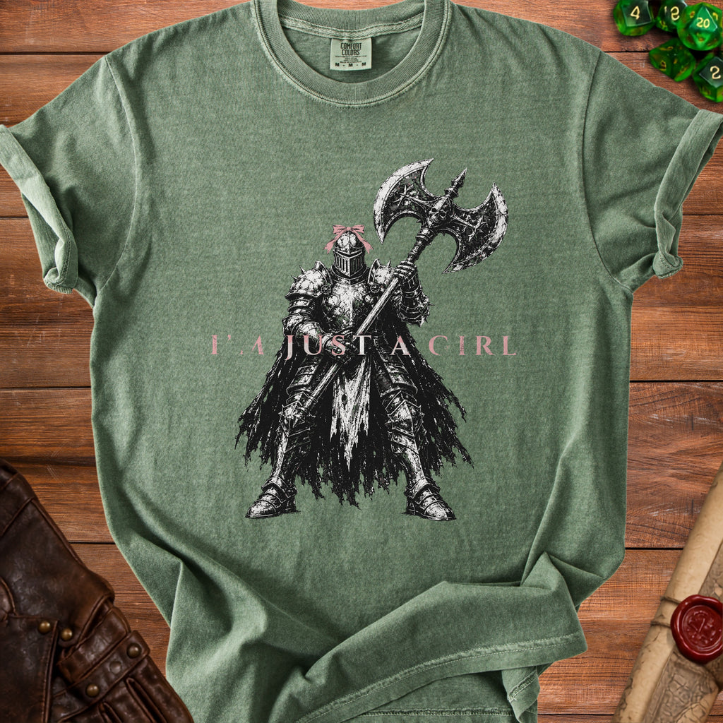 Green t-shirt with knight graphic and pink text "I'M JUST A GIRL".