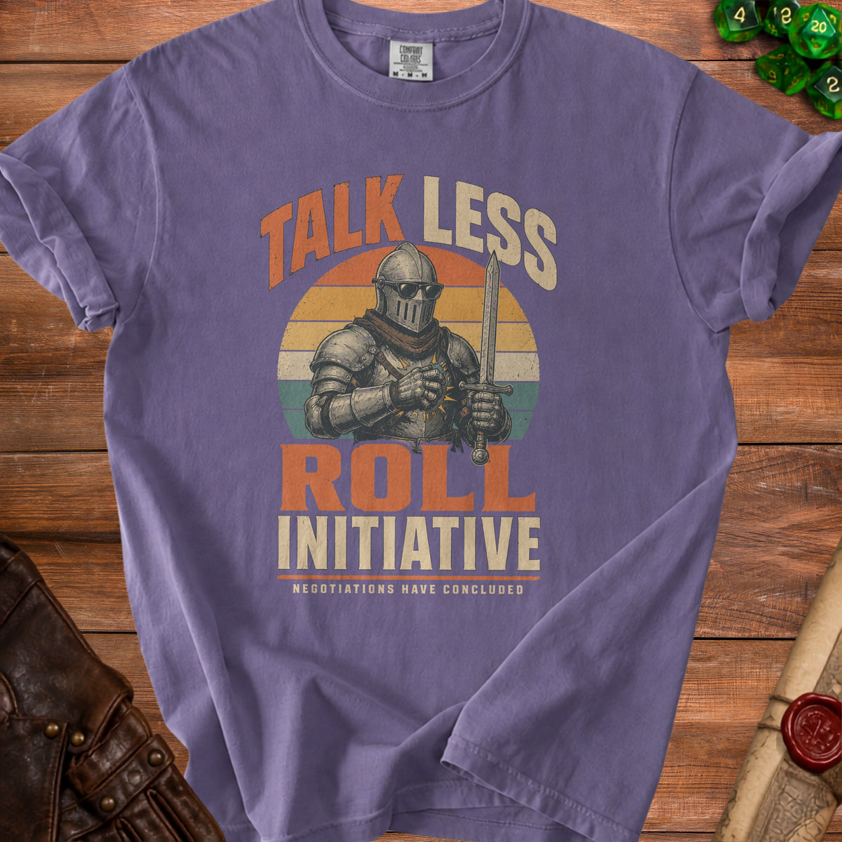 Purple t-shirt with knight graphic and text "Talk Less Roll Initiative".