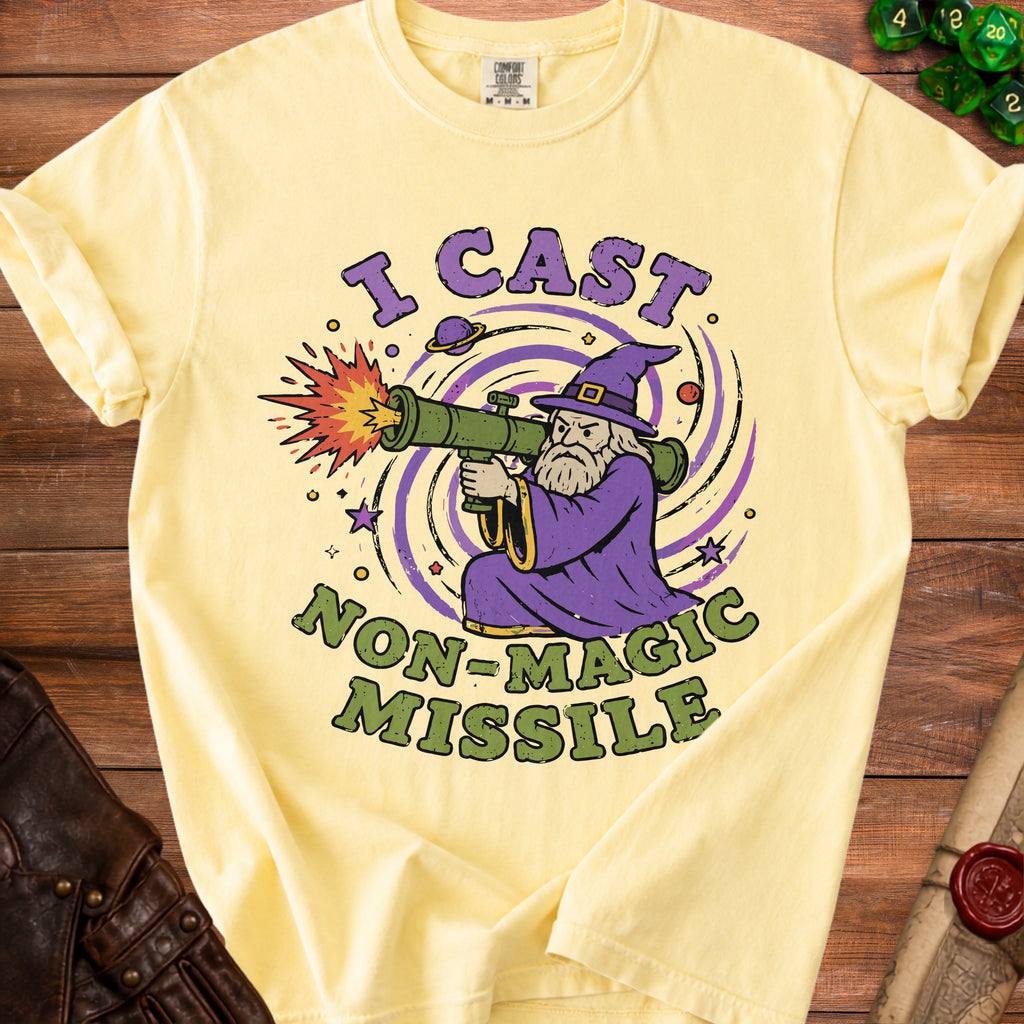 Yellow t-shirt with wizard firing a missile, reading "I Cast Non-Magic Missile."
