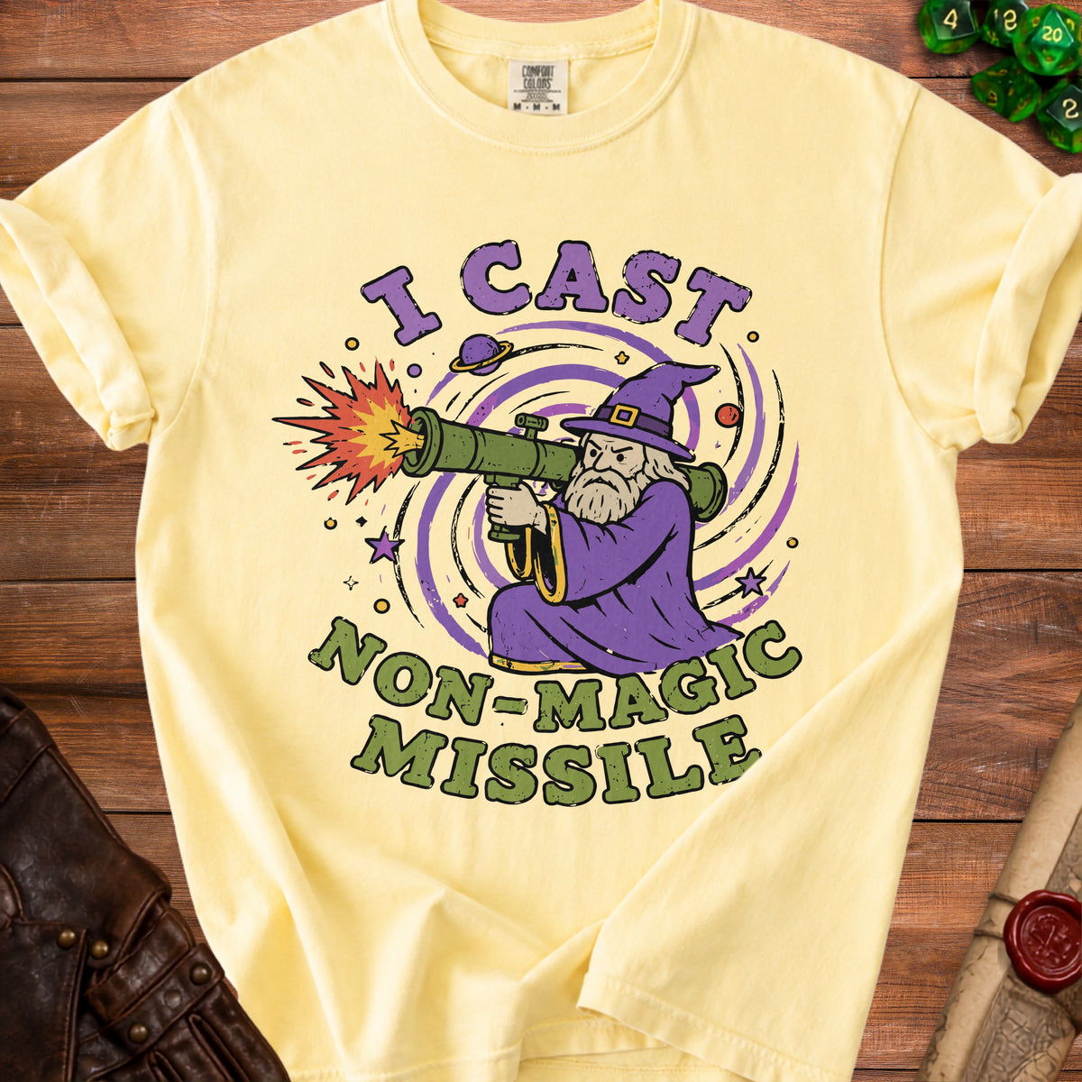 Yellow t-shirt with wizard firing a missile, reading "I Cast Non-Magic Missile."
