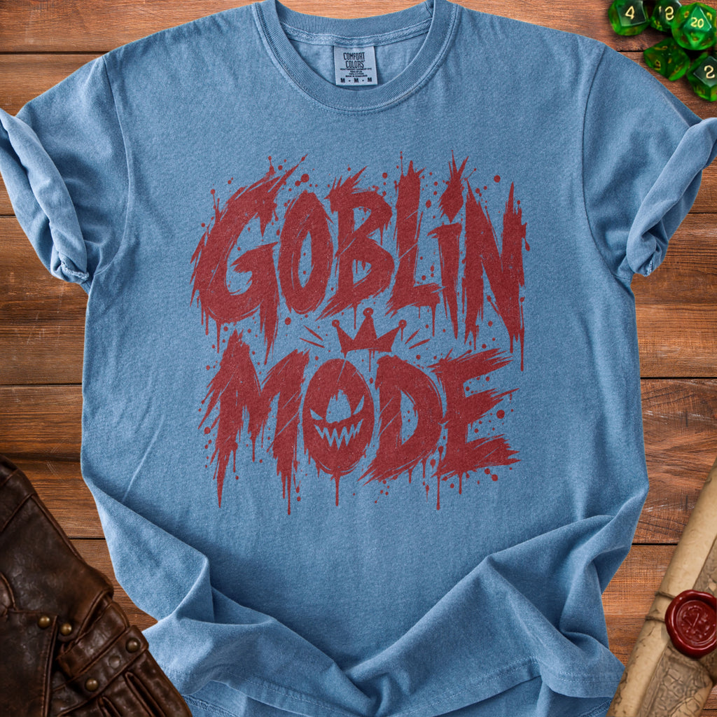 Blue t-shirt with red "Goblin Mode" text and crown graphic.