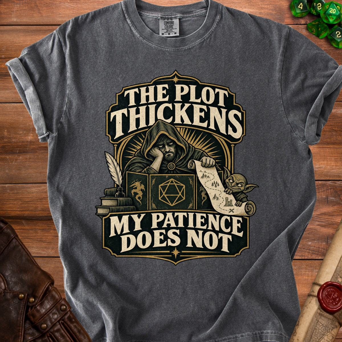 Dark gray t-shirt with "The Plot Thickens, My Patience Does Not" graphic.