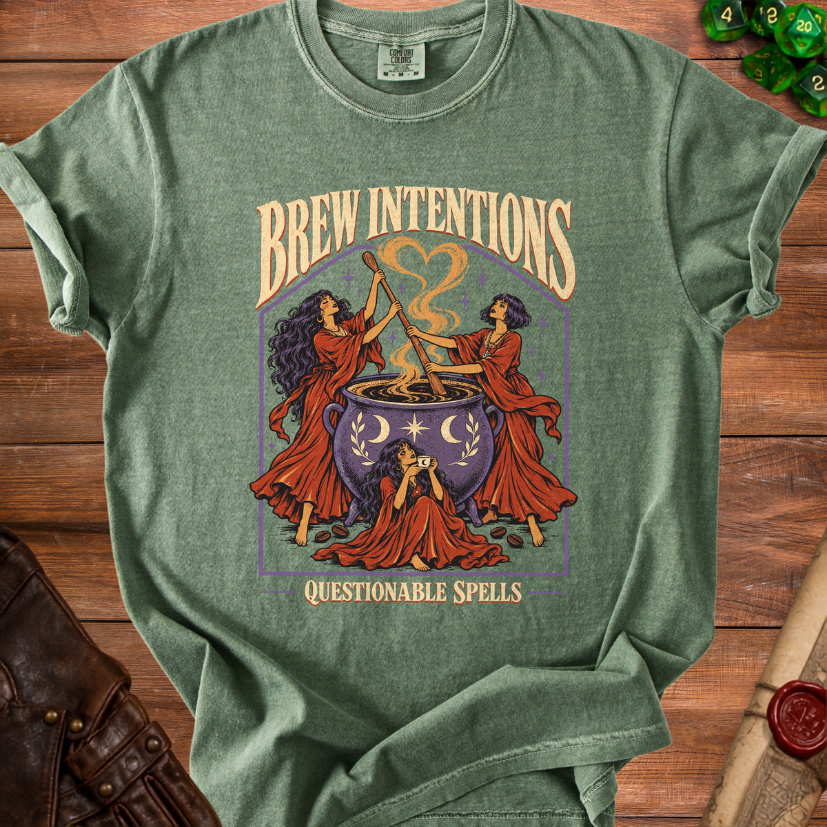 T-shirt with "Brew Intentions Questionable Spells" text and witches brewing.