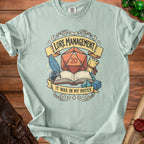 Light blue t-shirt with "Lore Management" and "It Was In My Notes" text and D20 die graphic.