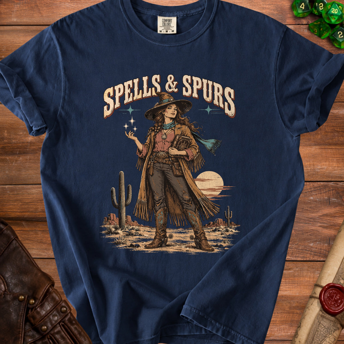 Spells & Spurs graphic of a cowgirl sorceress in a desert landscape.
