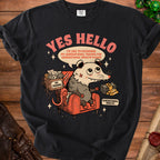 Black t-shirt with opossum on couch, "Yes Hello" and text about generational trauma and wealth.