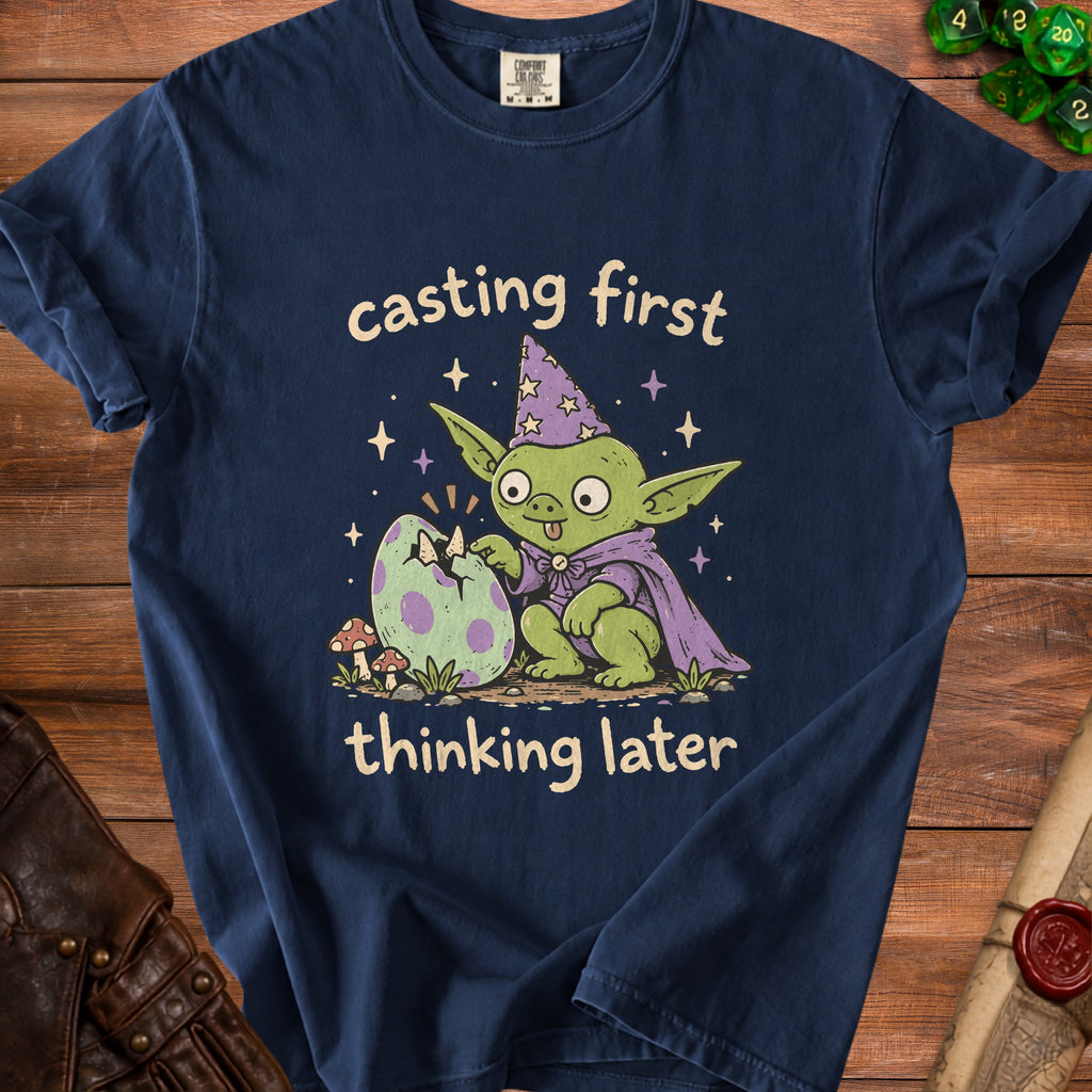 Green creature with wizard hat and cloak with cracked egg and text.