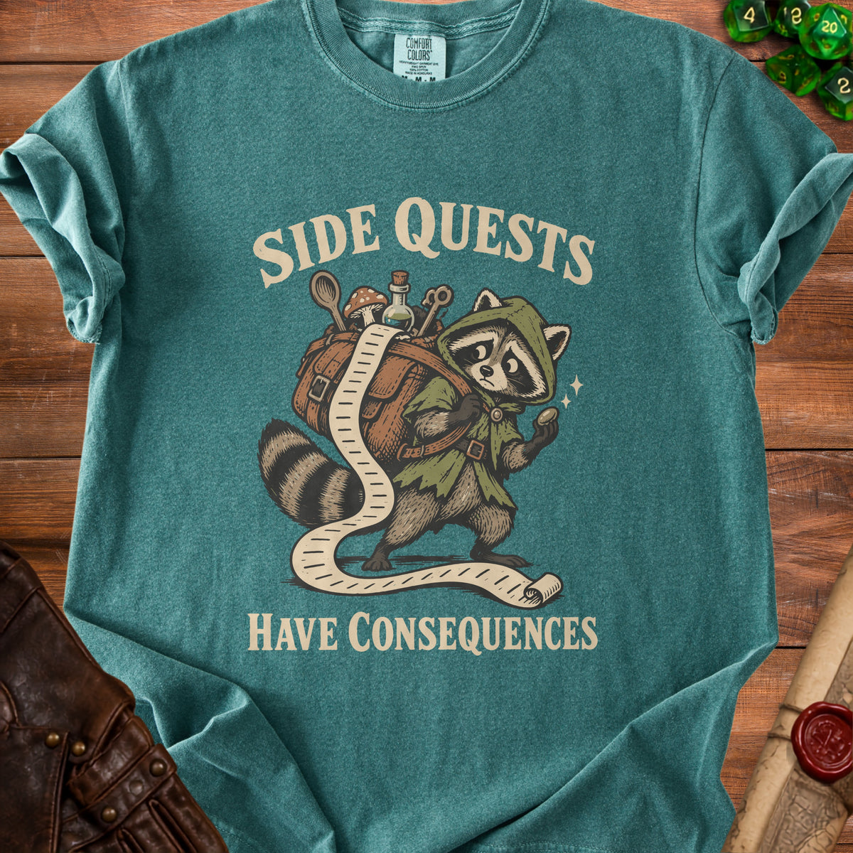 T-shirt with raccoon adventurer and text "Side Quests Have Consequences".