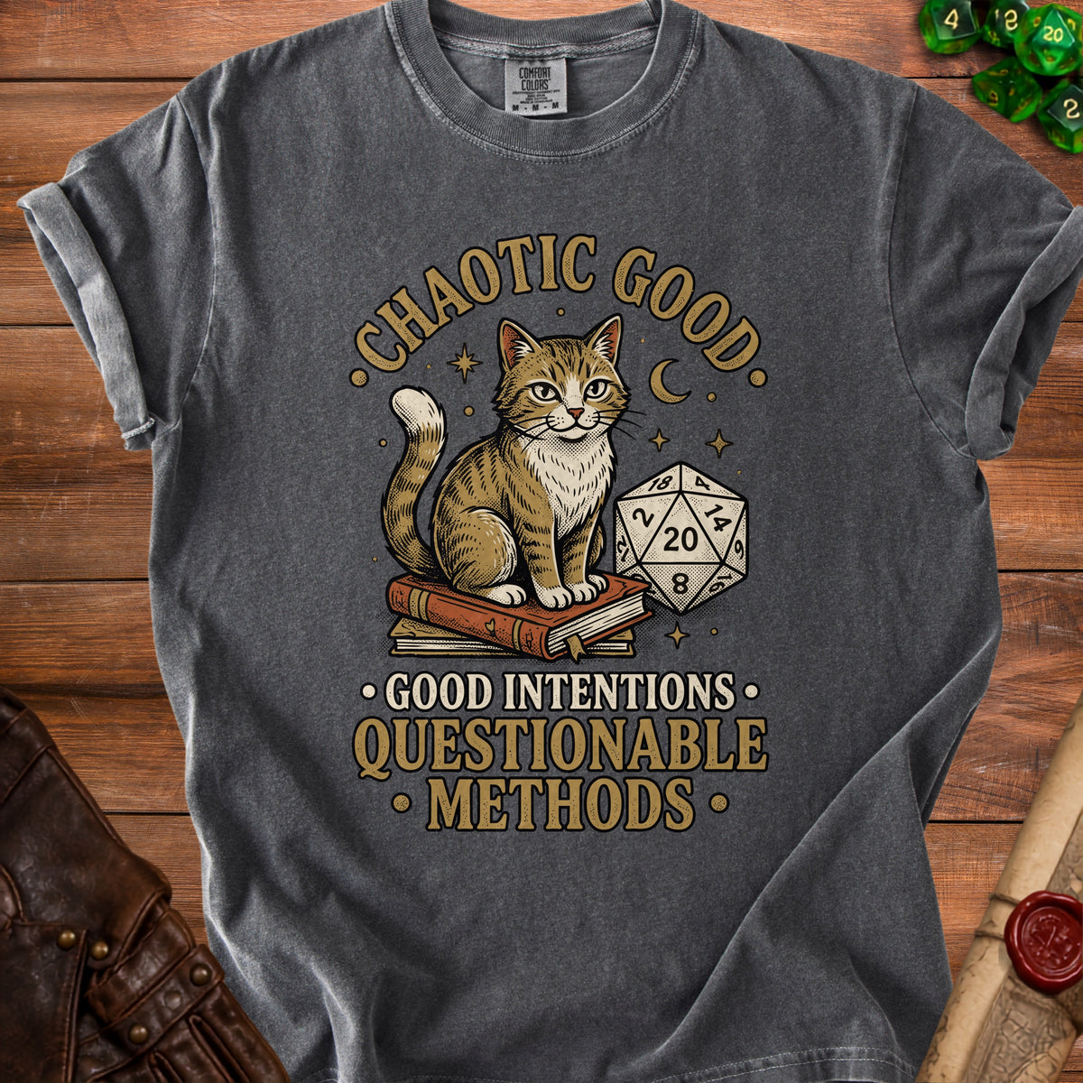 T-shirt with a cat sitting on books, D20 die, and text "Chaotic Good Good Intentions Questionable Methods".