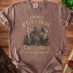 T-shirt with medieval knight, sword, coffee, and text "I Don't Rise & Shine. Caffeinate & Coordinate."