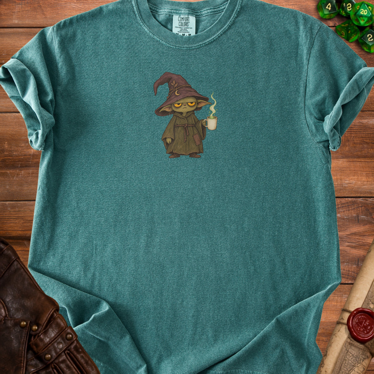 Teal Comfort Colors t-shirt with cartoon wizard holding a coffee mug.
