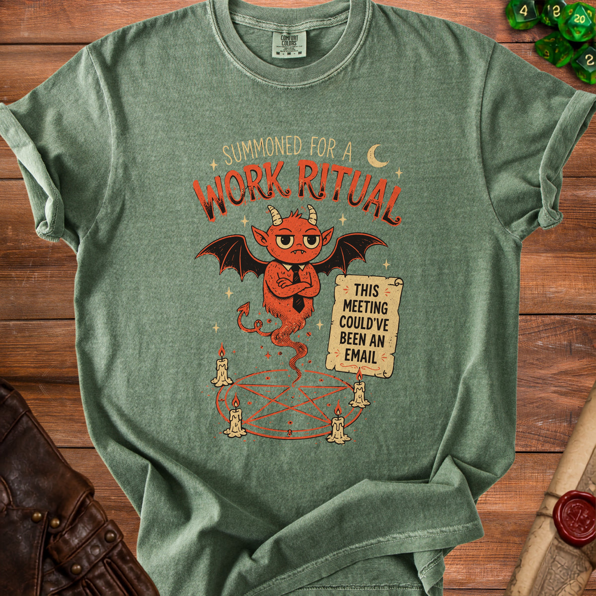 Green t-shirt with a cartoon devil and text "Summoned for a Work Ritual" and "This Meeting Could've Been an Email".