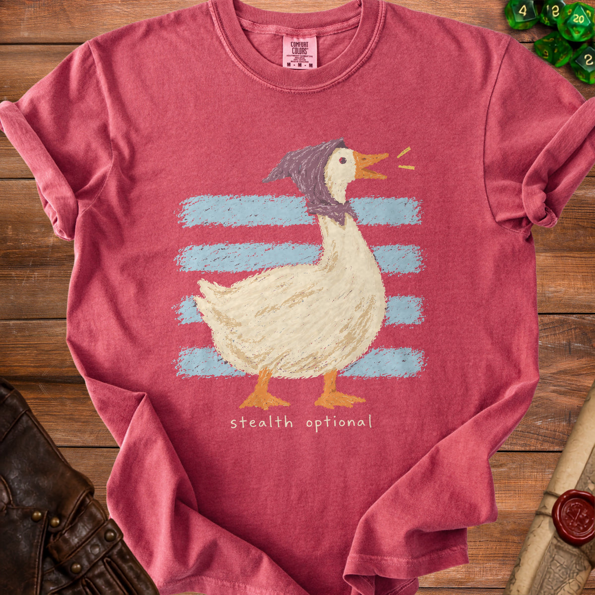 T-shirt with a goose wearing a bonnet and the text "stealth optional".