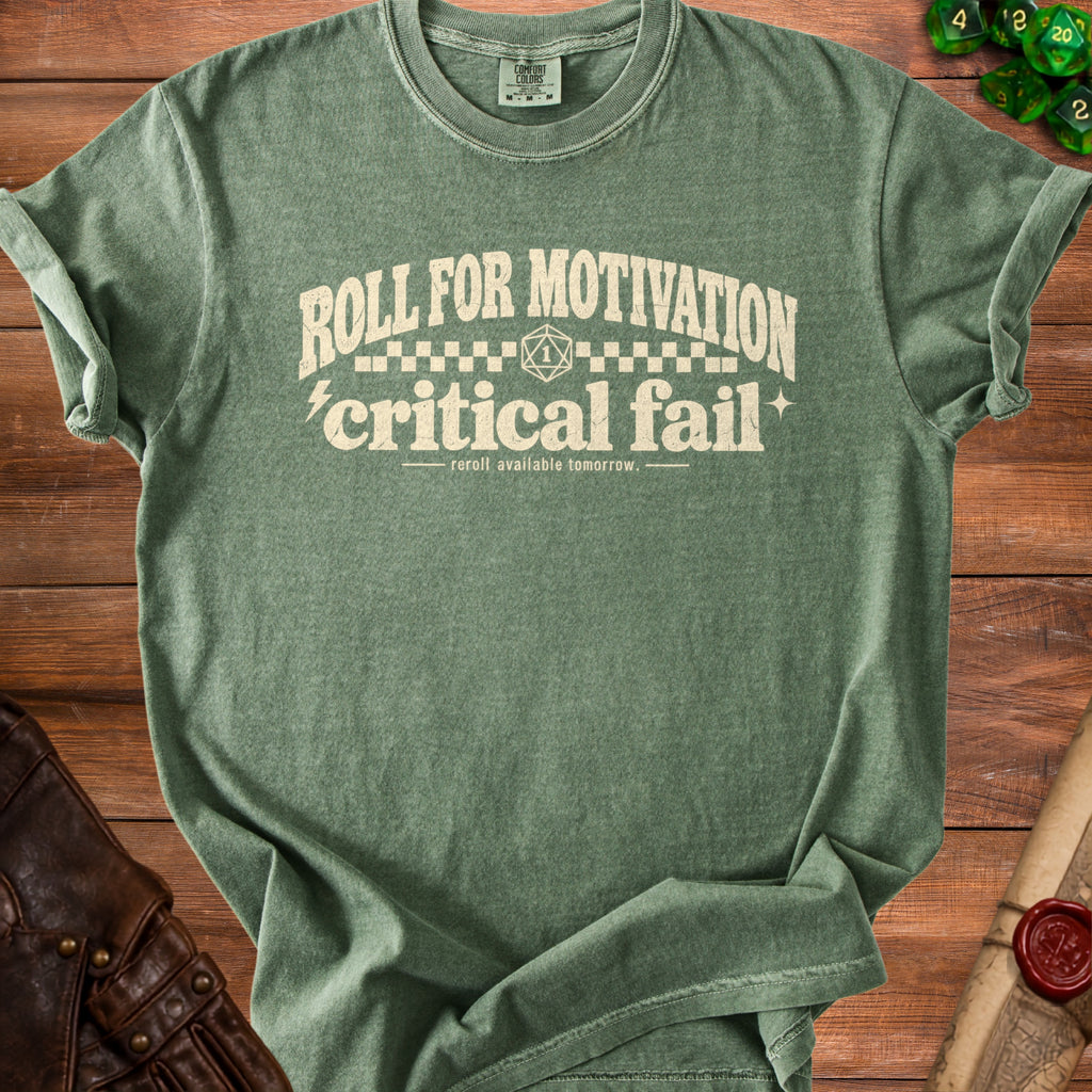 Green t-shirt with "Roll For Motivation, Critical Fail, Reroll Available Tomorrow" text.