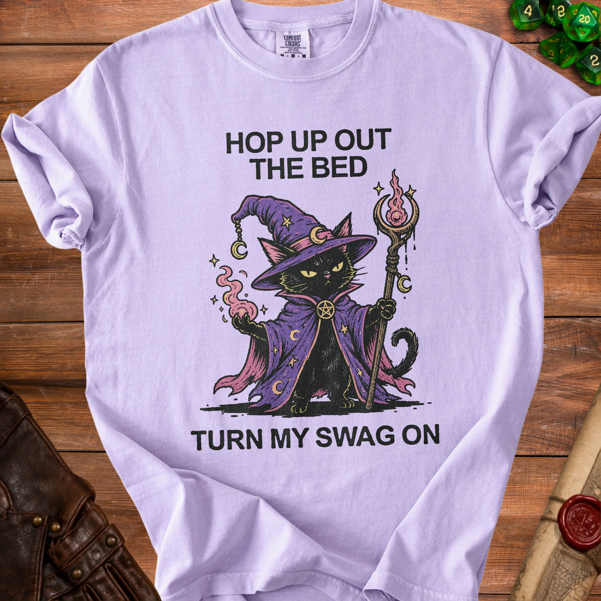 Light purple t-shirt with wizard cat graphic and text "Hop up out the bed turn my swag on".