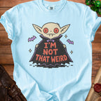 Light blue t-shirt with a vampire graphic saying "I'm Not That Weird."