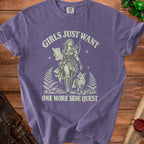 Purple t-shirt with a graphic of a female adventurer and fox, reading "Girls Just Want One More Side Quest".