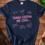 Navy blue t-shirt with "Things Keeping Me Civil" and list including hot tea, snack breaks.