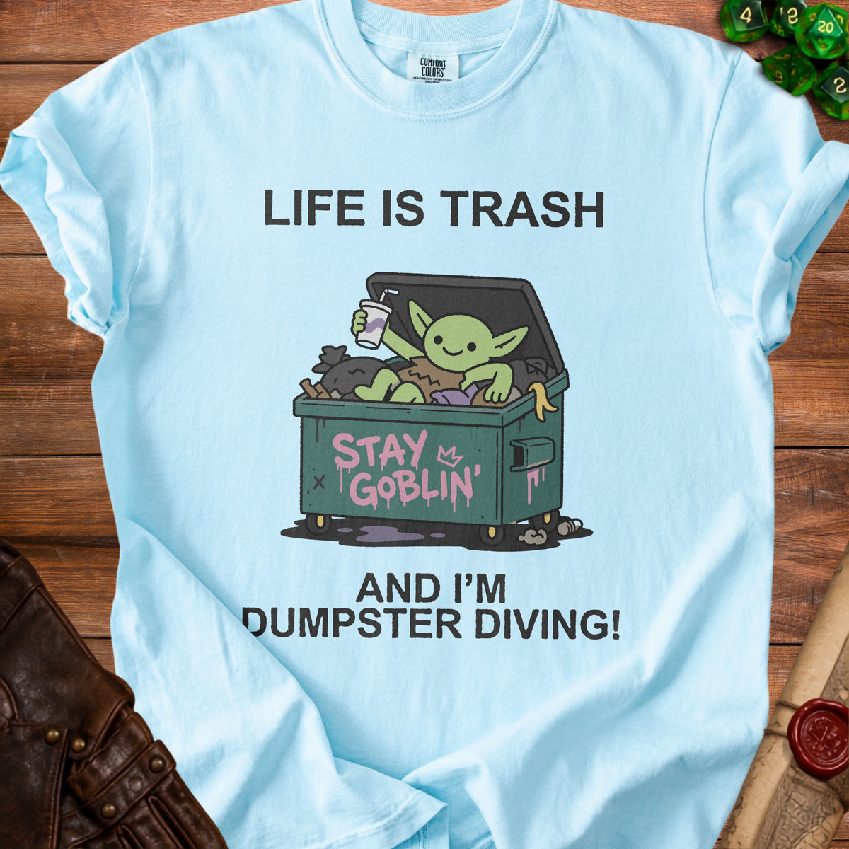 Light blue t-shirt with "Life is Trash And I'm Dumpster Diving!" text and goblin illustration.