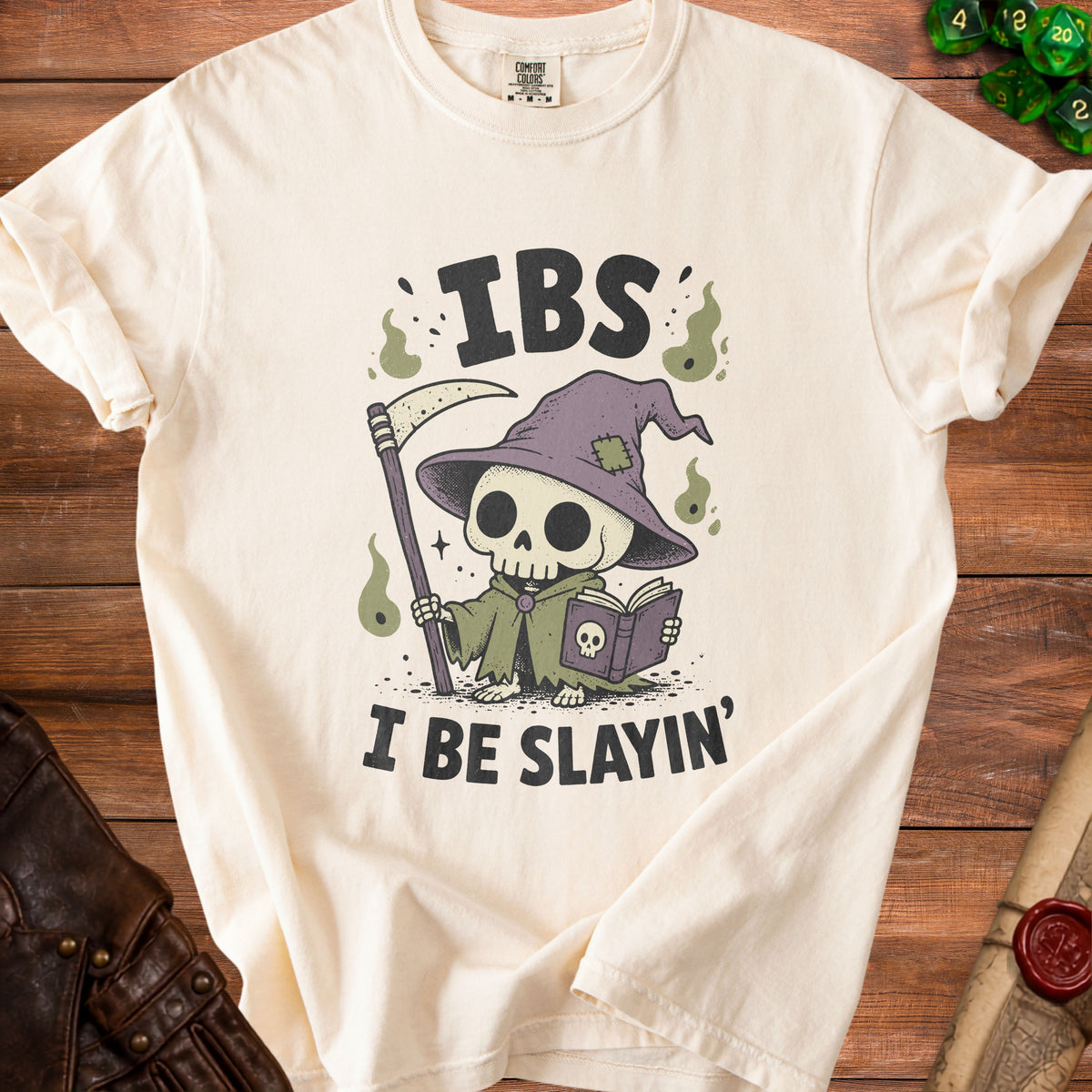 Cream t-shirt with grim reaper skeleton graphic and text "IBS I BE SLAYIN'".
