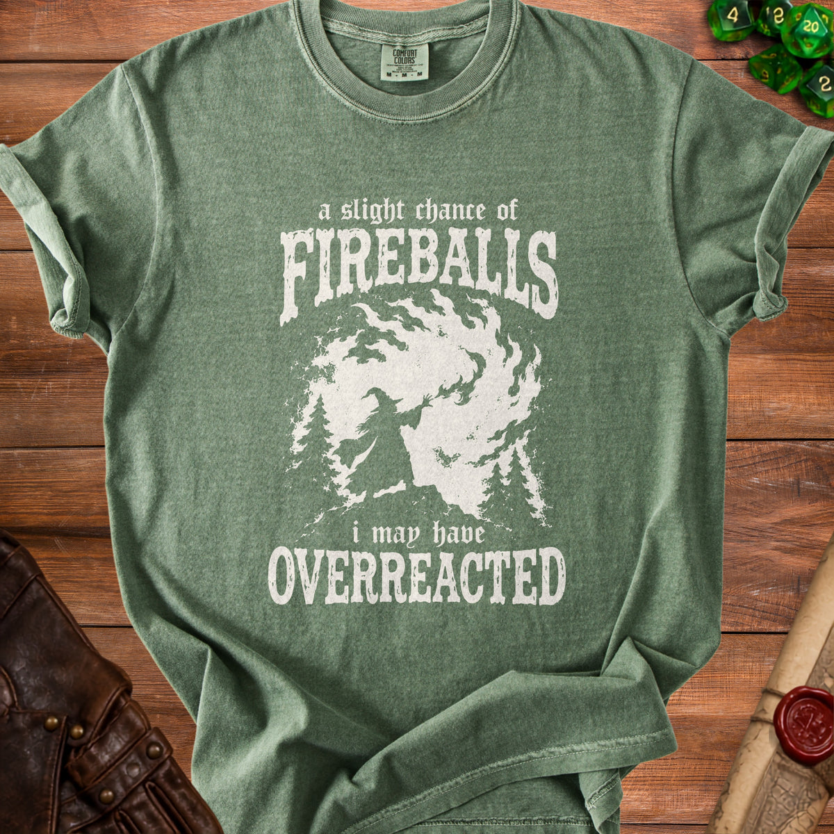 Green t-shirt with a wizard casting "a slight chance of FIREBALLS i may have OVERREACTED."