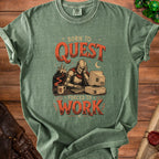 Green t-shirt graphic of knight at computer reading "Born to Quest Forced to Work".