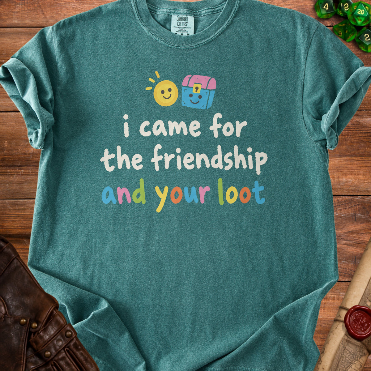 Teal t-shirt with "i came for the friendship and your loot" text and graphics.