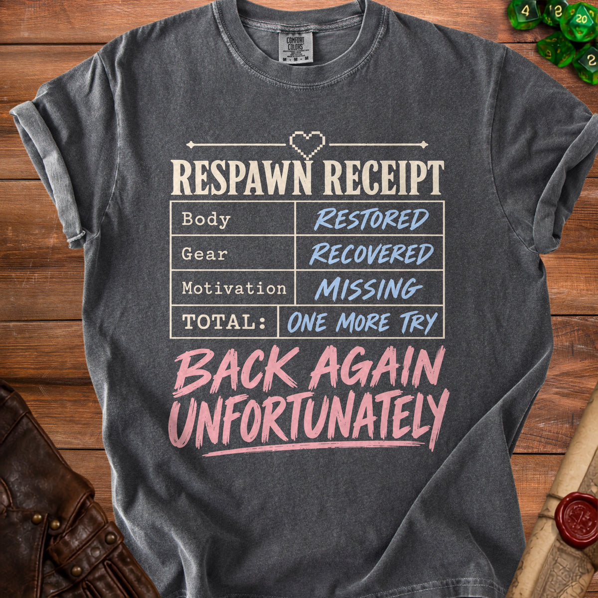 Gray t-shirt with "Respawn Receipt" text listing restored body, recovered gear, missing motivation, and one more try.