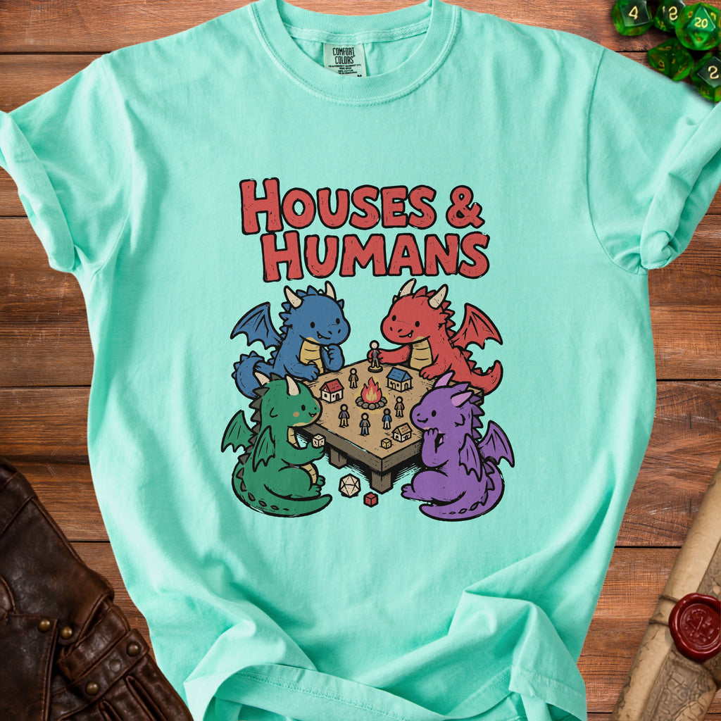 T-shirt with "HOUSES & HUMANS" text and four dragons playing a tabletop game.