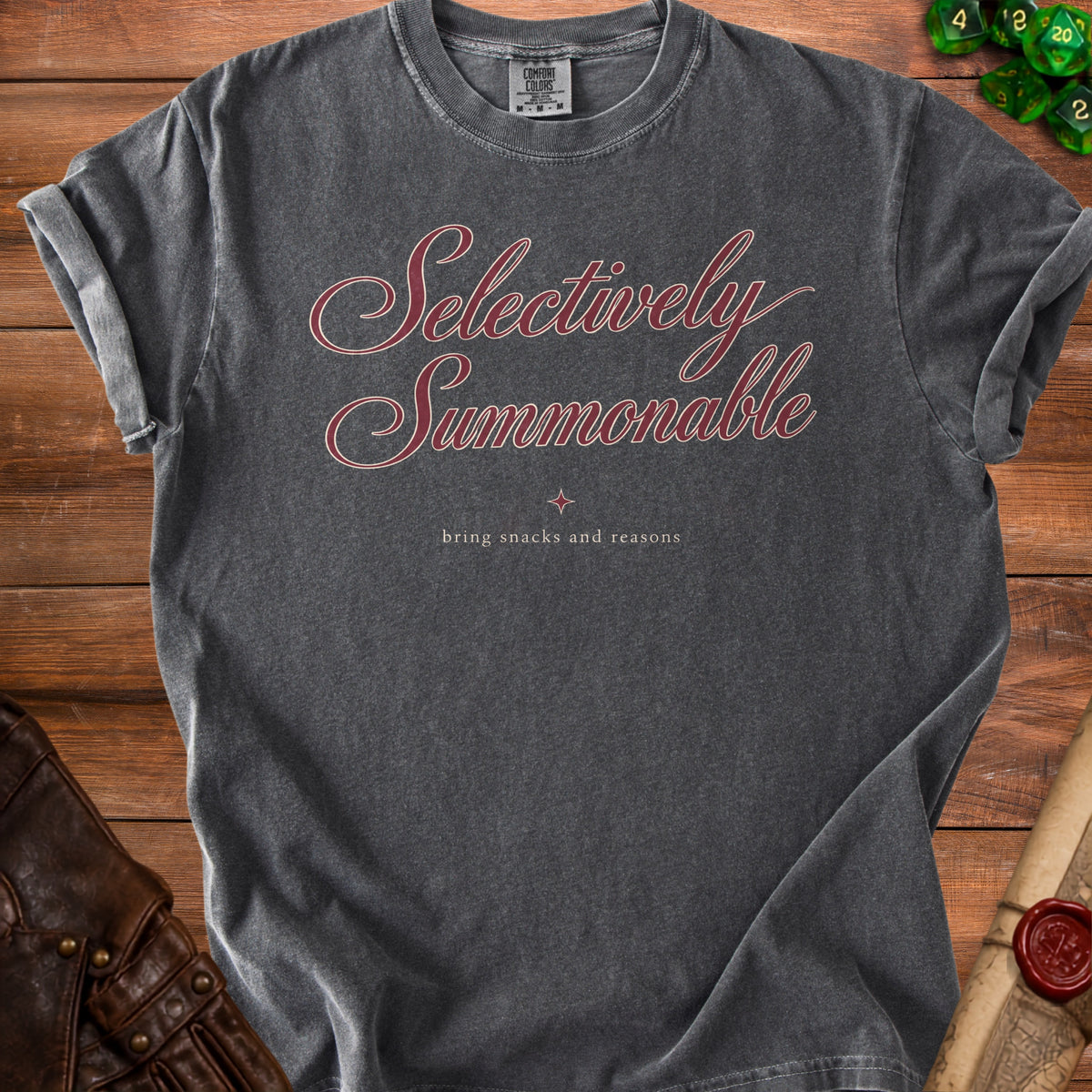 Dark grey t-shirt with "Selectively Summonable" and "bring snacks and reasons" text.