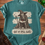 Skeleton wizard reads a book with text "Out of Spell Slots" and a d20 die.