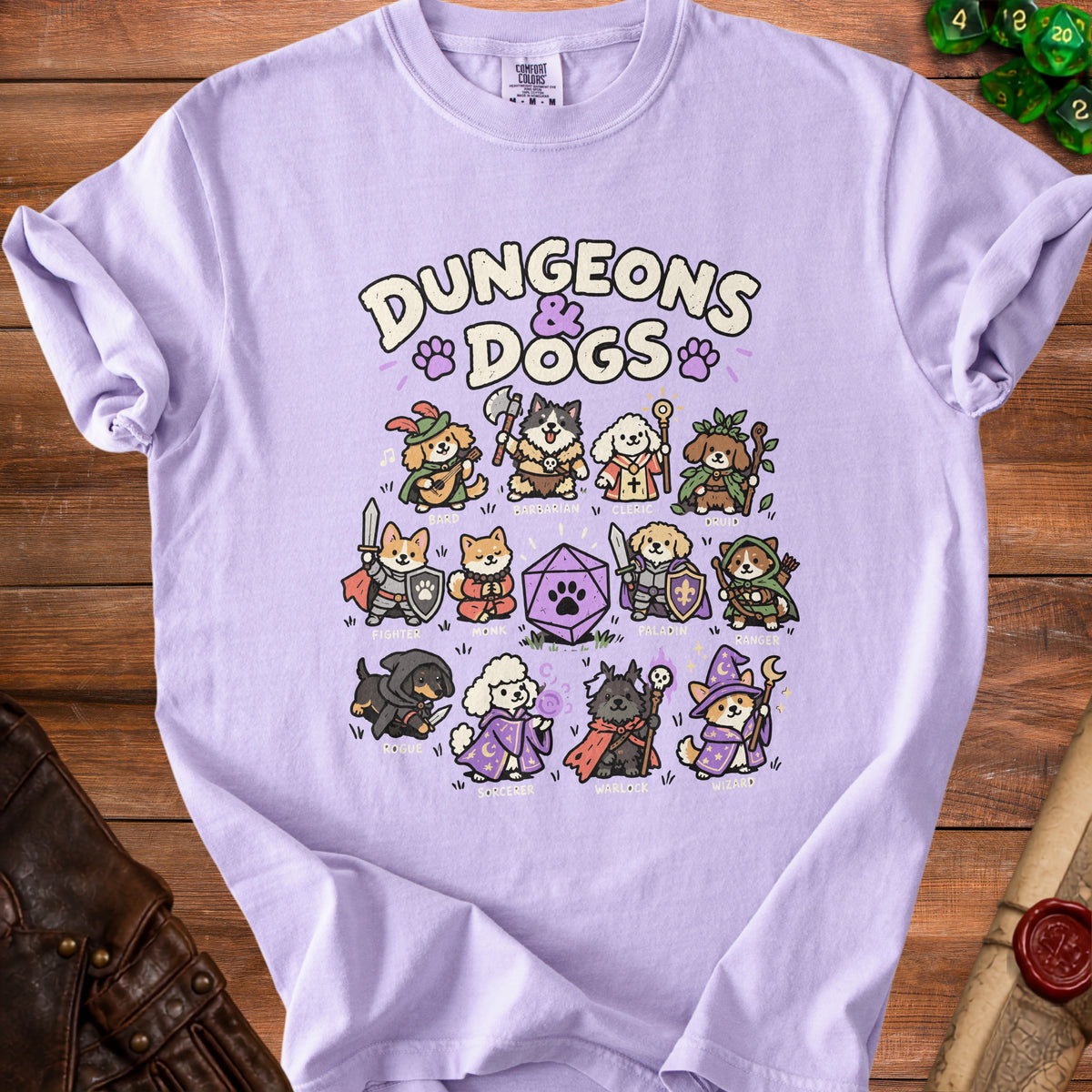 T-shirt with "Dungeons & Dogs" text and dog characters dressed as fantasy roles.