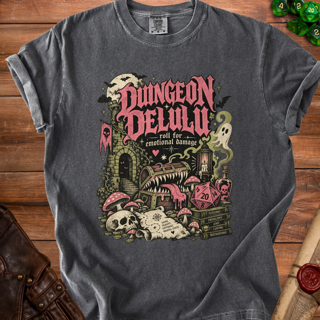 Dark grey t-shirt with a Dungeon Delulu graphic featuring a monster chest, skull, dice, and potions.