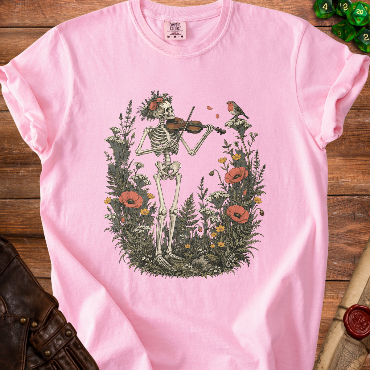 Skeleton playing violin surrounded by flowers with a robin perched nearby.