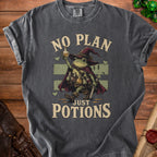 Frog wizard holding potion, text reads "No Plan Just Potions".