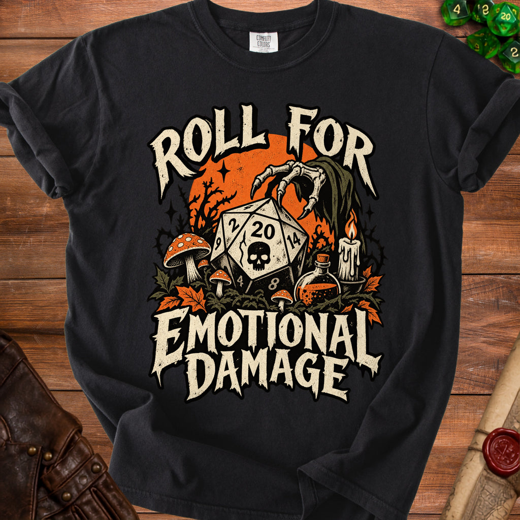 Black t-shirt with "Roll for Emotional Damage" text, a d20 die, skull, mushrooms, and candle.