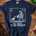 Navy t-shirt with knight and goose graphic, text reads "MY SQUIRE IS THE PROBLEM."