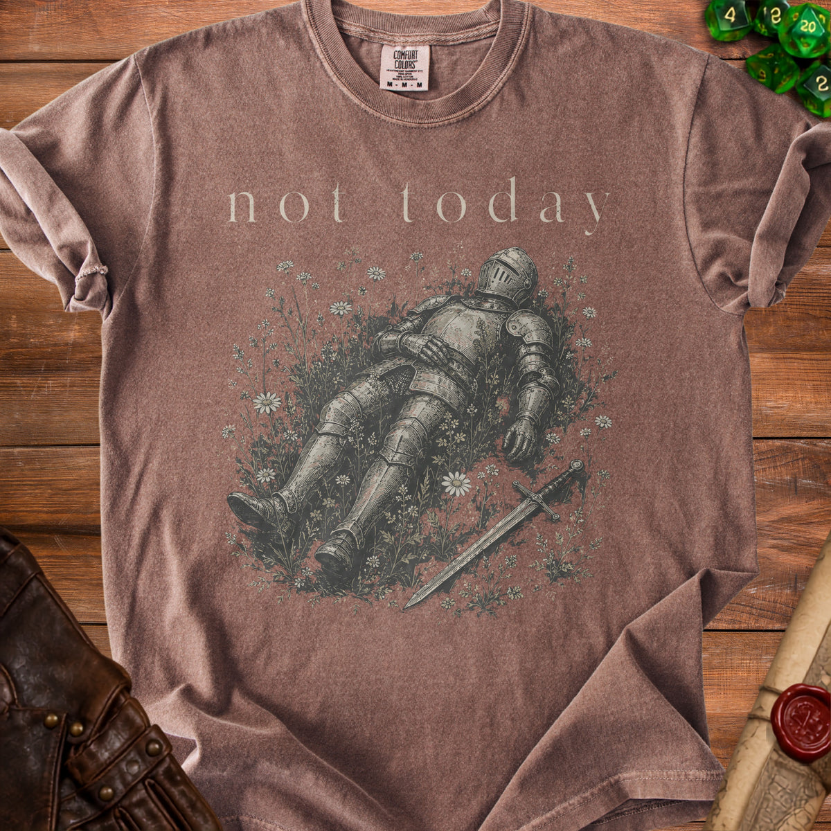 T-shirt with knight in armor lying in flowers and "not today" text.