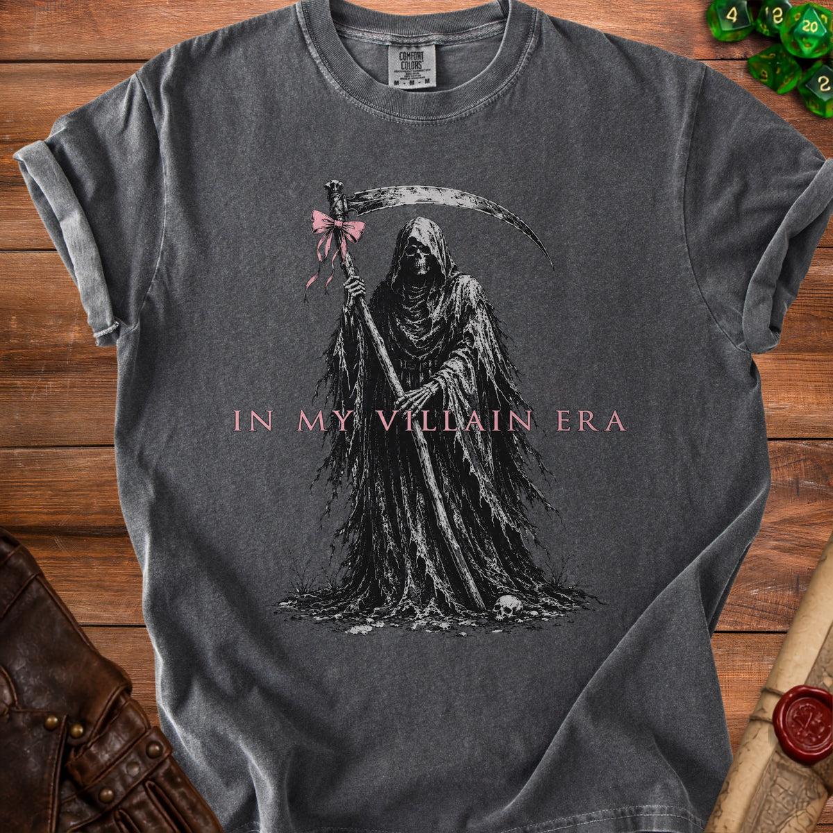 Dark gray t-shirt with Grim Reaper graphic and text "IN MY VILLAIN ERA".