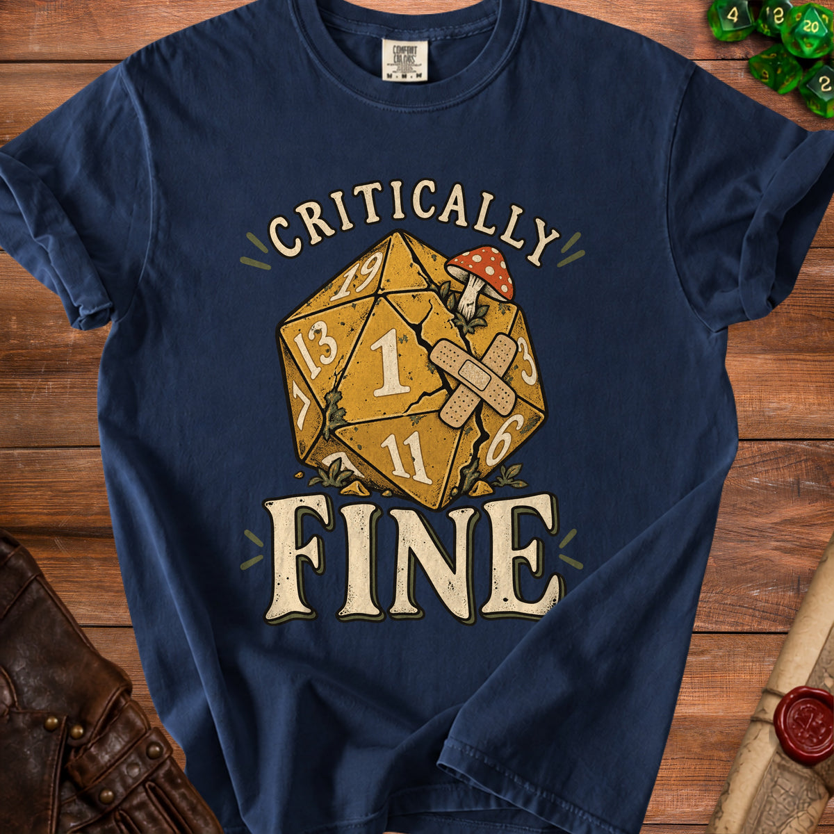 Navy t-shirt with a D20 die graphic and text "CRITICALLY FINE."