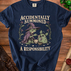 Frog wizard feeds a monster from a teacup with text "ACCIDENTALLY SUMMONED A RESPONSIBILITY".