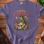 T-shirt with graphic of a grim reaper frog sitting on a skull.