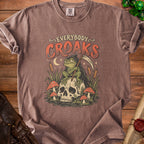 Brown t-shirt with Grim Reaper frog illustration and "Everybody Croaks" text.