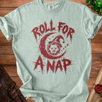 Light blue t-shirt with red "Roll for a nap" text and DnD dice graphic.