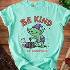 Teal t-shirt with a cartoon goblin and text "BE KIND ...OF ANNOYING".