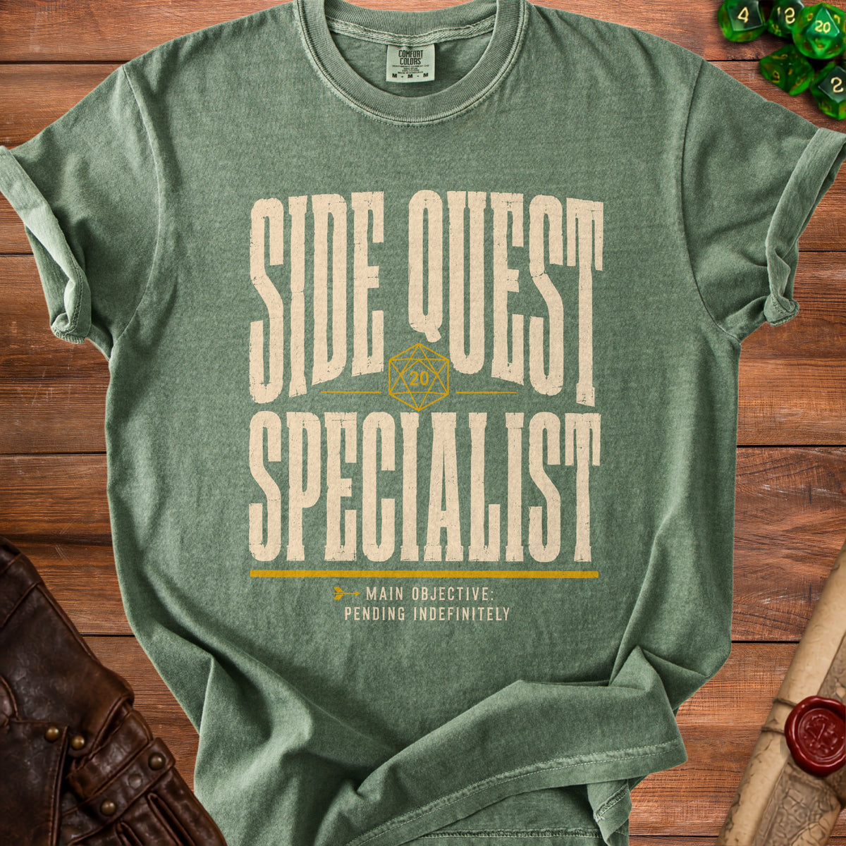 Green t-shirt with "Side Quest Specialist" and "Main Objective: Pending Indefinitely".