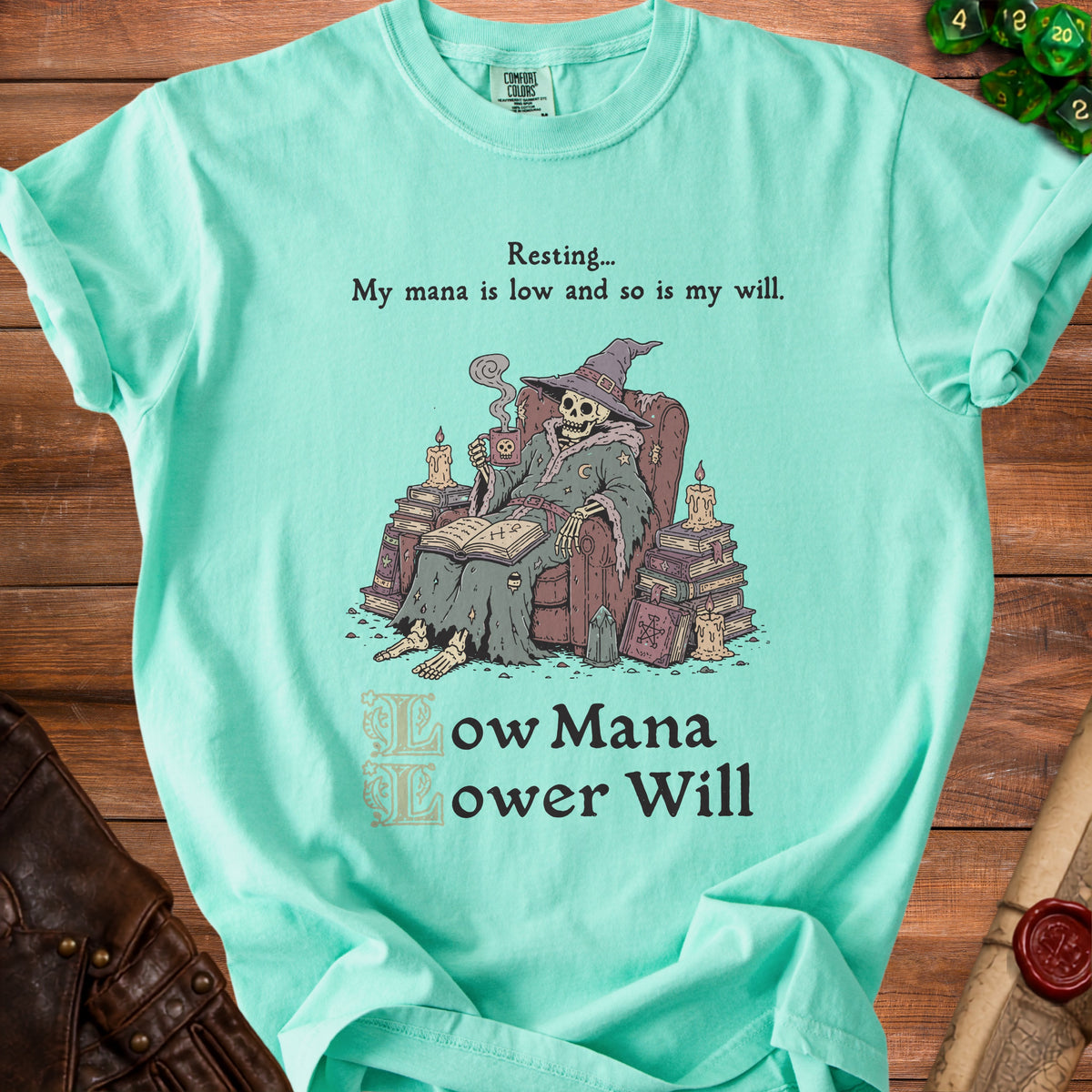 T-shirt with skeleton wizard graphic reading "Resting... My mana is low and so is my will."